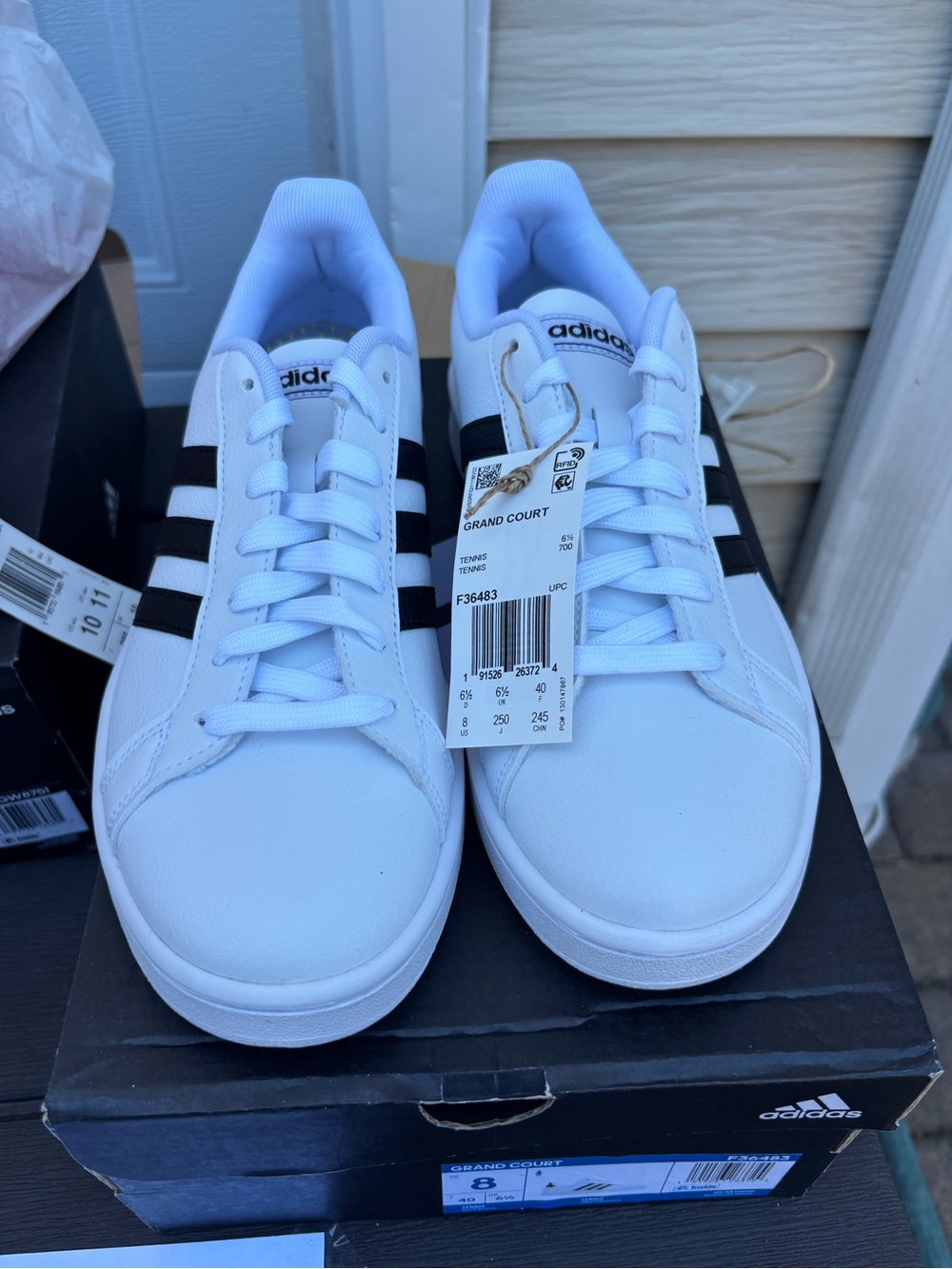 adidas White Sneakers with Black Stripes